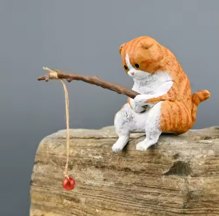 orange fishing gashapon cat
